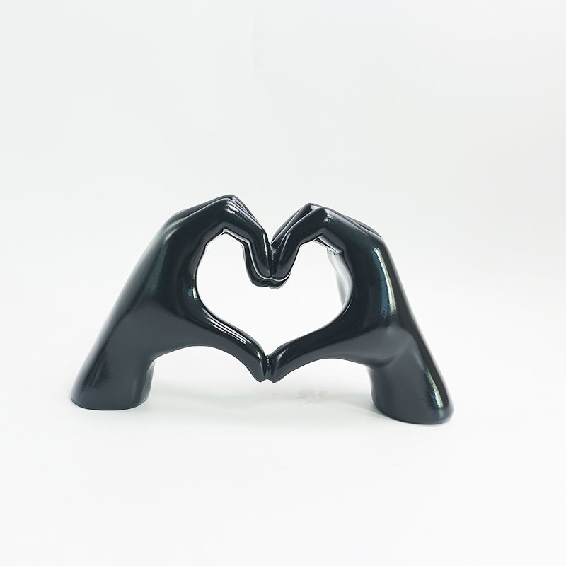 Polyresin hand hart zwart